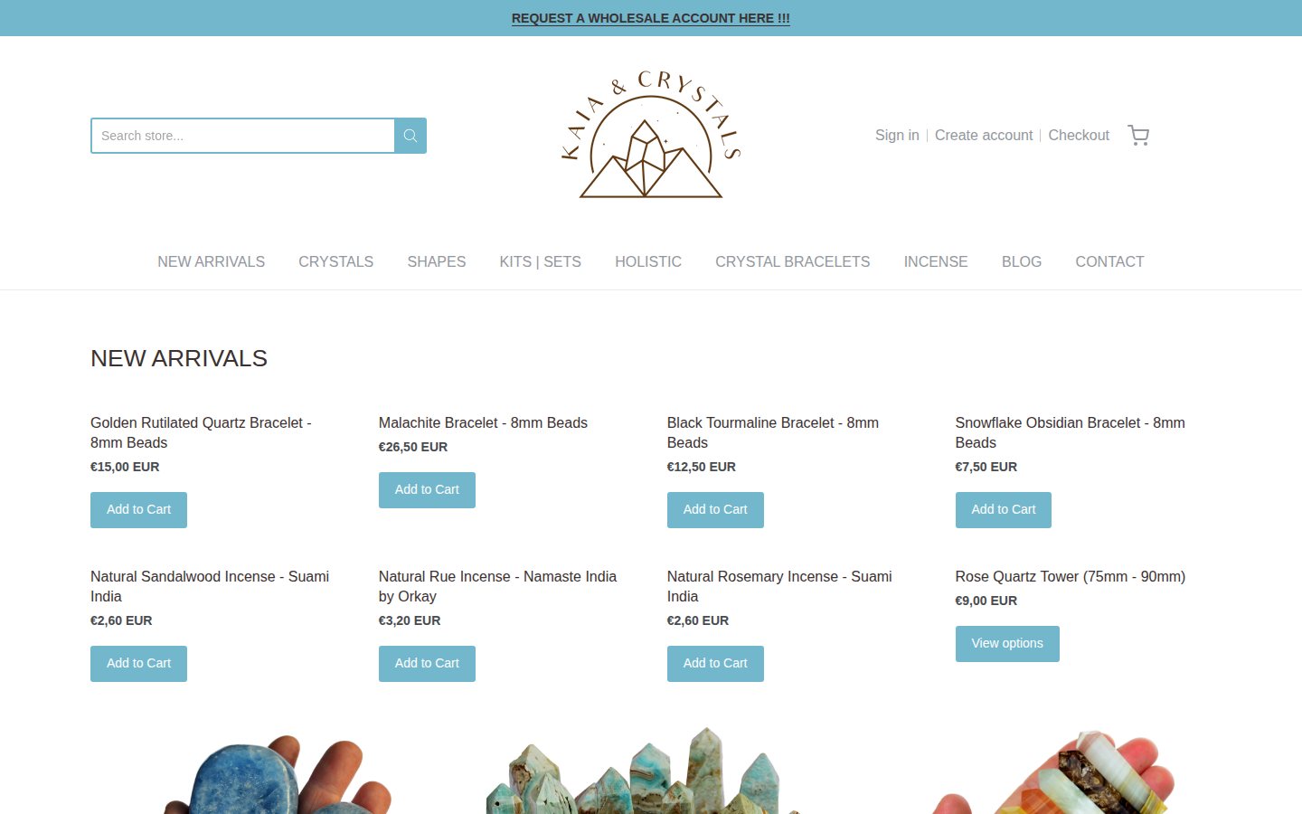 Kaia & Crystals home page with a wholesale account banner above the header and retail prices on the product grid